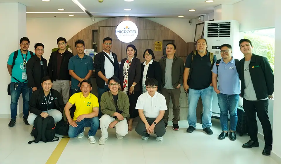 Participants of the workshop gather for a group photo at Microtel by Wyndham UP Technohub following the training sessions.