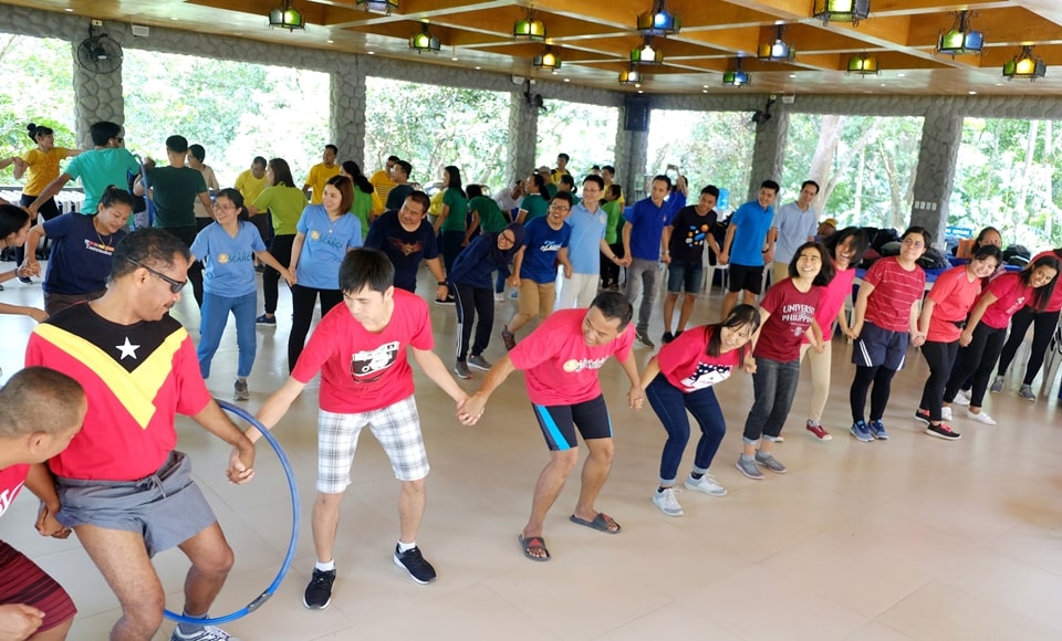 Hoops Relay. Love Team passing the hula hoop to claim their second win.