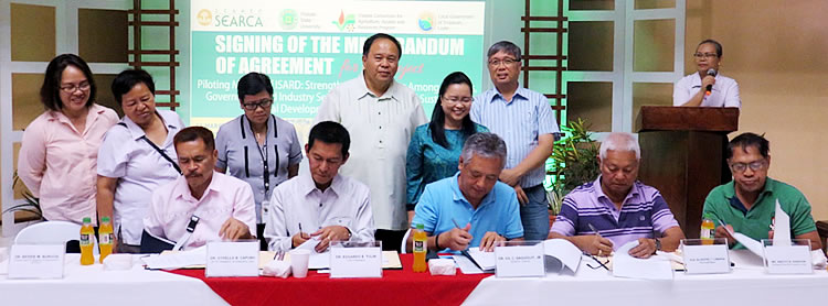 (Front L-R) Dr. Othello Capuno, Dr. Edgardo Tulin, Dr. Gil C. Saguiguit, Jr., Hon. Silvestre Lumarda, Mr. Anecito Asencion &ndash; while signing the MOA. (Back L-R) Mrs. Rebecca Macabenta-Cormanes, Dr. Wolfreda T. Alesna, Dr. Vilma Patindol, Dr. Jose Bacusmo, Dr. Bessie Burgos and Prof. Rolando Bello acts as witnesses.