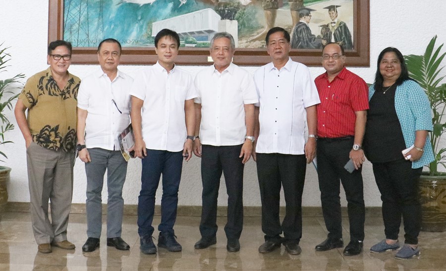 Dr. Saguiguit (center) flanked by Governor Hernandez (on his left) and Los Ba&ntilde;os Mayor Cesar Perez (on his right) along with other local government officials of Laguna, Philippines