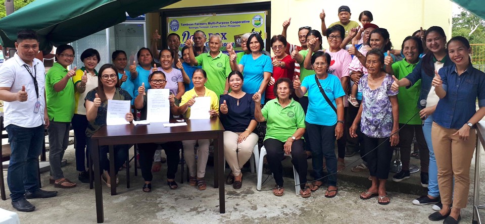 Members of Bohol Dairy Cooperative pose for a souvenir photo as they receive the equipment, tools, and supplies for The Dairy Box &ndash; Bohol on 15 February 2018 at Tamboan, Carmen, Bohol