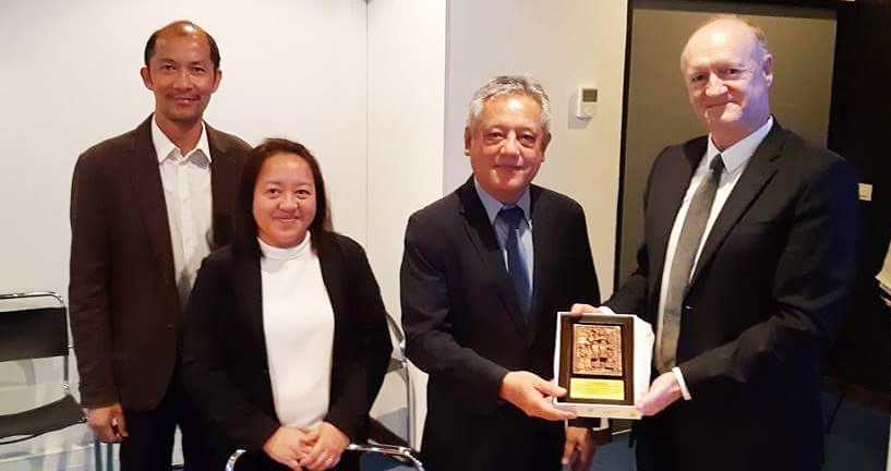 Dr. Saguiguit presents to Dr. Kosuth as institutional gift a replica of SEARCA&rsquo;s growth monument. They were joined by Mr. Oliver Oliveros (leftmost), Deputy Director for Partnerships and International Cooperation of Agropolis Fondation.
